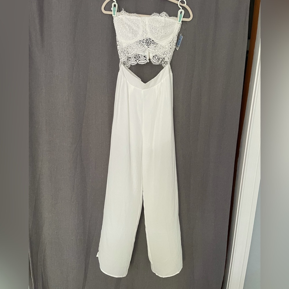 White lace bra top one piece pants romper with cut out midriff and inner shorts